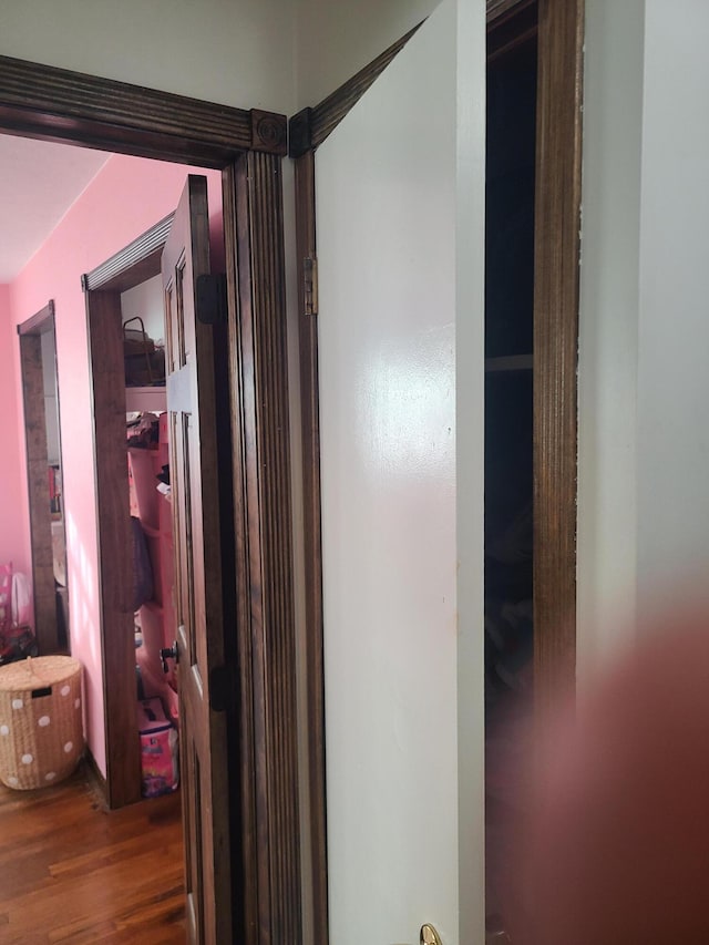 511 3rd St, Mccune, MO 66753 - hallway featuring wood finished floors