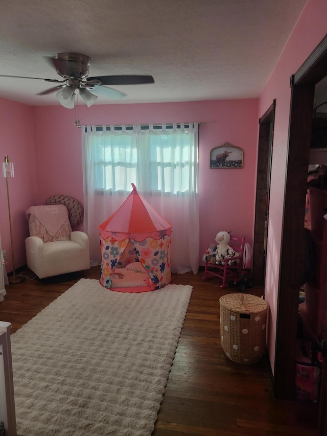 511 3rd St, Mccune, MO 66753 - bedroom with wood finished floors and a ceiling fan