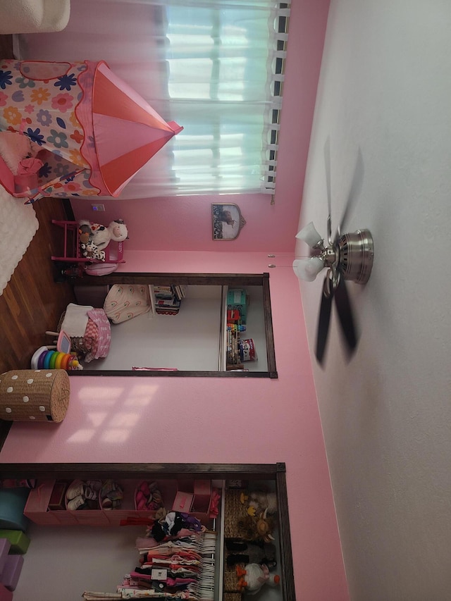 511 3rd St, Mccune, MO 66753 - bedroom featuring wood walls