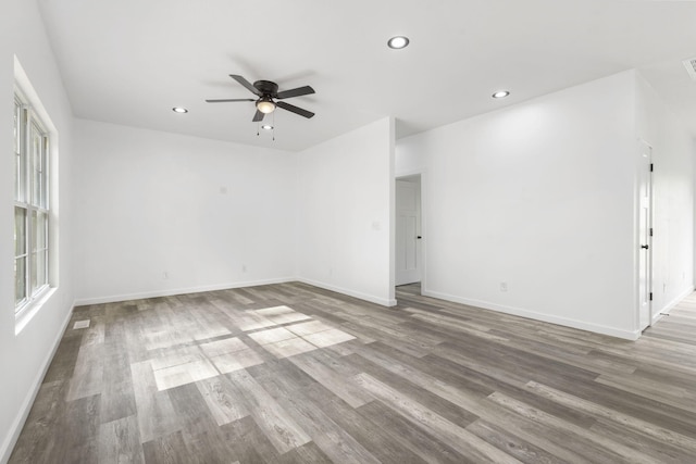 806 Iris Ave, Crane, MO 65633 - spare room with ceiling fan, baseboards, wood finished floors, and recessed lighting