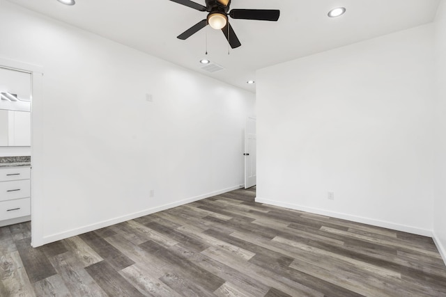 806 Iris Ave, Crane, MO 65633 - empty room with a ceiling fan, dark wood-type flooring, recessed lighting, and baseboards