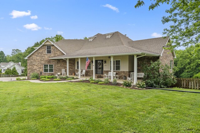 4936 S Butterfield Pl, Brookline, MO 65619 - view of front facade with roof with shingles and brick siding