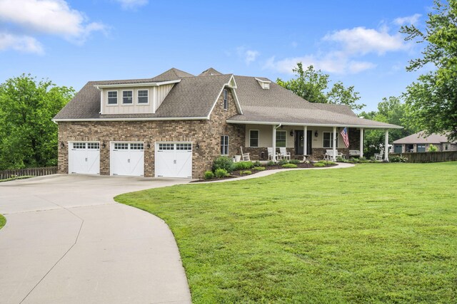 4936 S Butterfield Pl, Brookline, MO 65619 - craftsman inspired home with covered porch, concrete driveway, brick siding, and roof with shingles