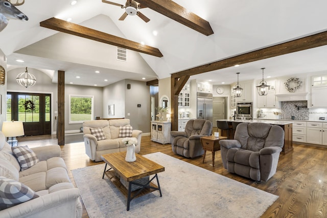 4936 S Butterfield Pl, Brookline, MO 65619 - living area featuring beam ceiling, a chandelier, recessed lighting, a ceiling fan, and dark wood-style floors