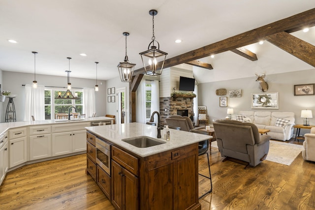 4936 S Butterfield Pl, Brookline, MO 65619 - kitchen featuring a sink, appliances with stainless steel finishes, open floor plan, white cabinetry, and recessed lighting