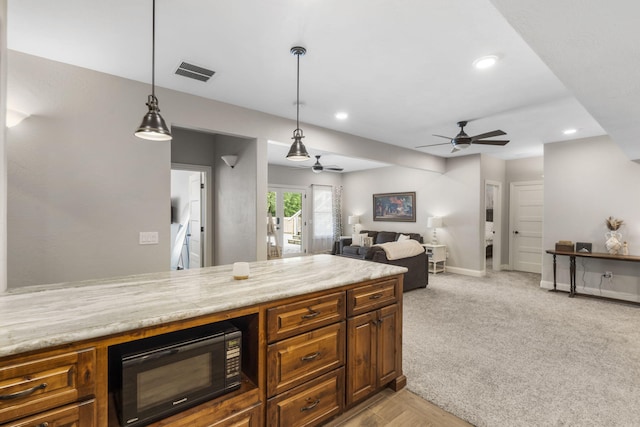 4936 S Butterfield Pl, Brookline, MO 65619 - kitchen featuring black microwave, ceiling fan, recessed lighting, decorative light fixtures, and baseboards