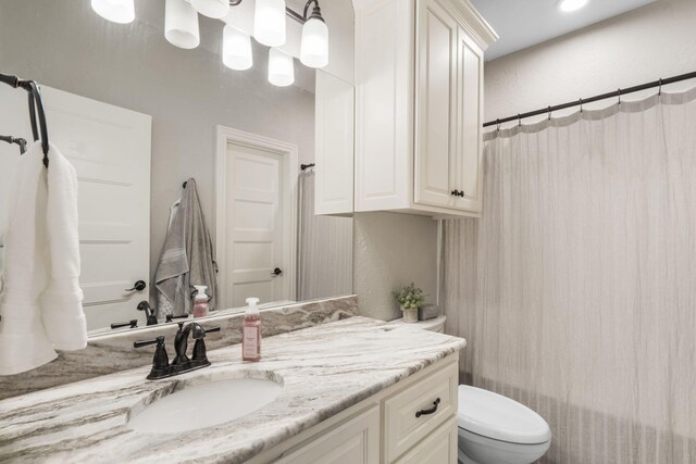 4936 S Butterfield Pl, Brookline, MO 65619 - full bathroom with vanity, toilet, and curtained shower