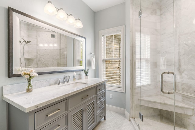 4936 S Butterfield Pl, Brookline, MO 65619 - full bath with vanity, a shower stall, baseboards, and tile patterned flooring