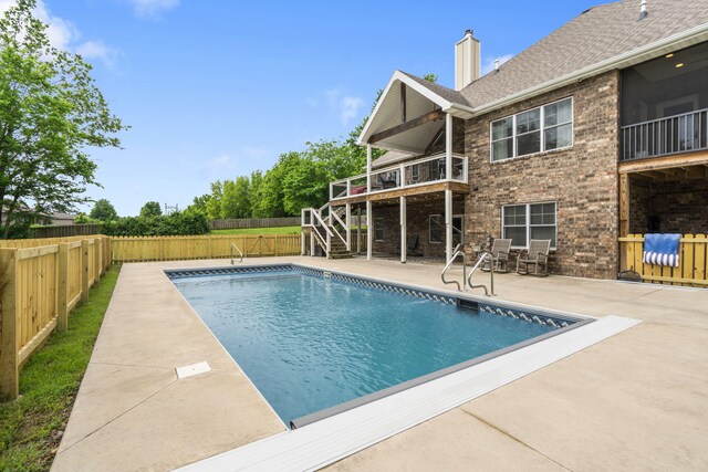 4936 S Butterfield Pl, Brookline, MO 65619 - view of pool with stairs, a fenced backyard, a patio, and a deck