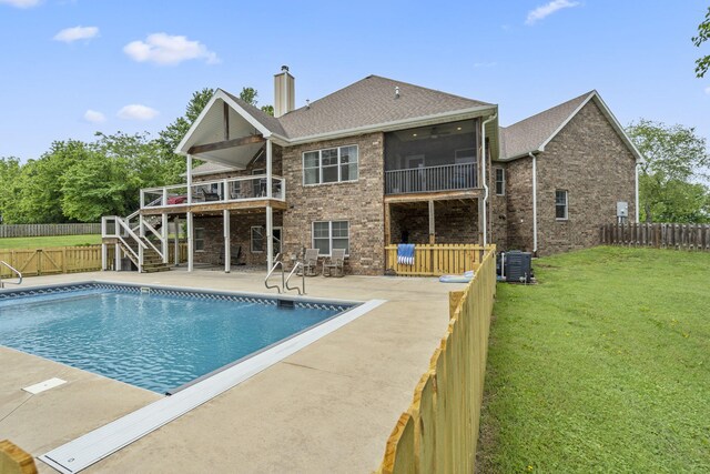 4936 S Butterfield Pl, Brookline, MO 65619 - view of swimming pool with stairway, a patio, a wooden deck, central air condition unit, and a sunroom