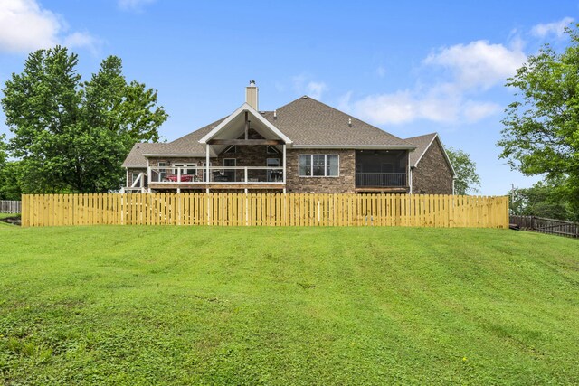 4936 S Butterfield Pl, Brookline, MO 65619 - rear view of property with brick siding, a sunroom, a chimney, and a shingled roof