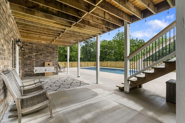 4936 S Butterfield Pl, Brookline, MO 65619 - fenced backyard featuring a patio and stairs