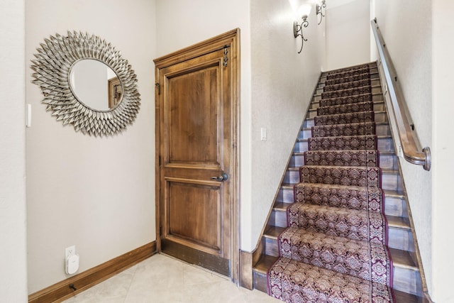 3731 S Farm Rd Unit 219, Rogersville, MO 65742 - stairway with tile patterned floors and baseboards