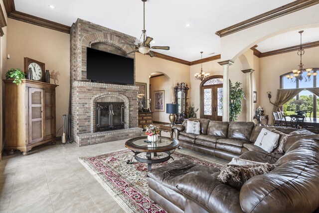 3731 S Farm Rd Unit 219, Rogersville, MO 65742 - living room featuring a chandelier, arched walkways, a ceiling fan, ornamental molding, and recessed lighting