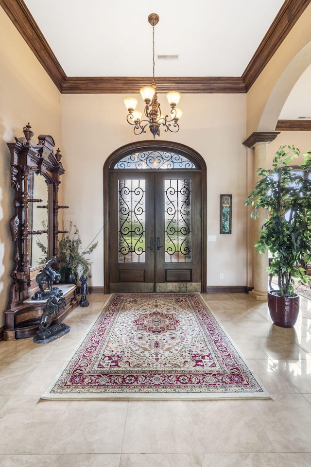 3731 S Farm Rd Unit 219, Rogersville, MO 65742 - tiled entrance foyer featuring arched walkways, french doors, crown molding, a chandelier, and a towering ceiling