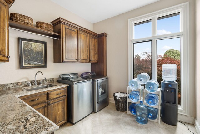 3731 S Farm Rd Unit 219, Rogersville, MO 65742 - laundry area with independent washer and dryer, cabinet space, and baseboards
