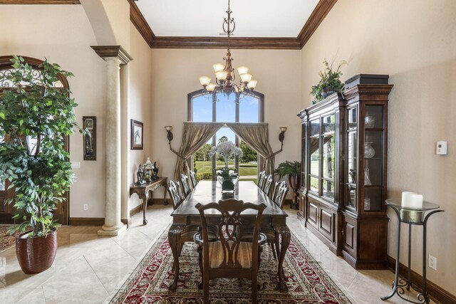 3731 S Farm Rd Unit 219, Rogersville, MO 65742 - dining room with ornate columns, a chandelier, ornamental molding, baseboards, and a high ceiling