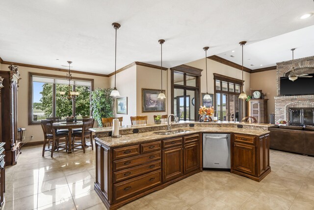 3731 S Farm Rd Unit 219, Rogersville, MO 65742 - kitchen featuring a sink, dishwasher, ornamental molding, open floor plan, and hanging light fixtures