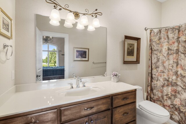 3731 S Farm Rd Unit 219, Rogersville, MO 65742 - full bath with toilet, vanity, and a shower with shower curtain