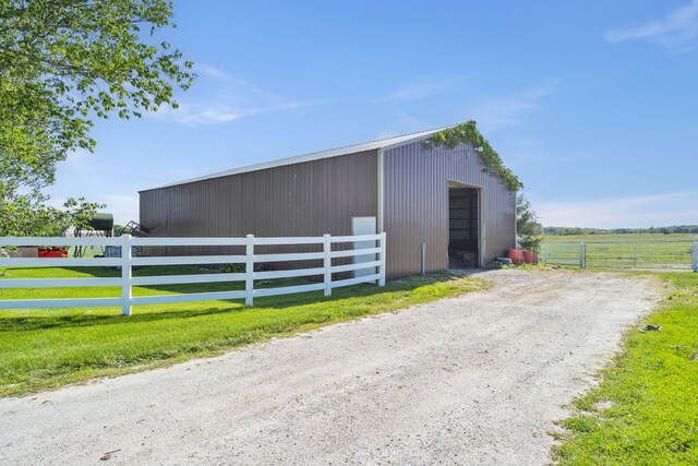 3731 S Farm Rd Unit 219, Rogersville, MO 65742 - view of pole building with an exterior structure and driveway