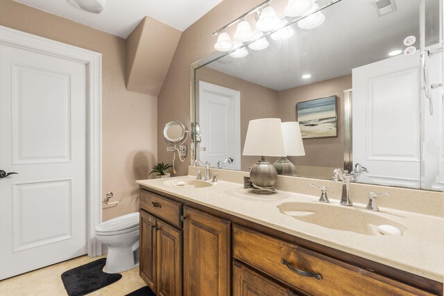 3731 S Farm Rd Unit 219, Rogersville, MO 65742 - full bathroom featuring toilet, double vanity, and tile patterned floors