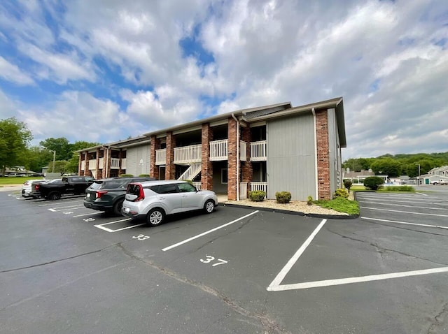 123 River Point Rd Unit 33, Hollister, MO 65672 - view of property featuring uncovered parking