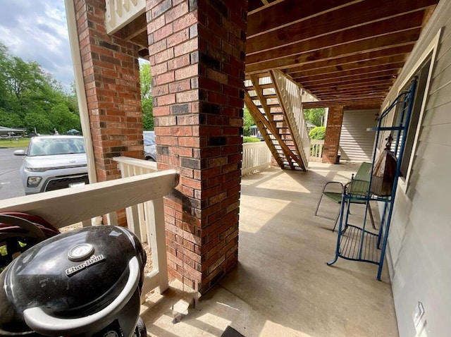 123 River Point Rd Unit 33, Hollister, MO 65672 - view of patio / terrace with stairs