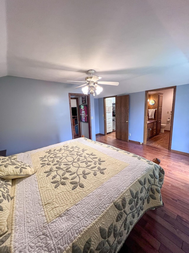 21650 Kings Loop, Hermitage, MO 65668 - bedroom with wood finished floors, ceiling fan, and ensuite bath