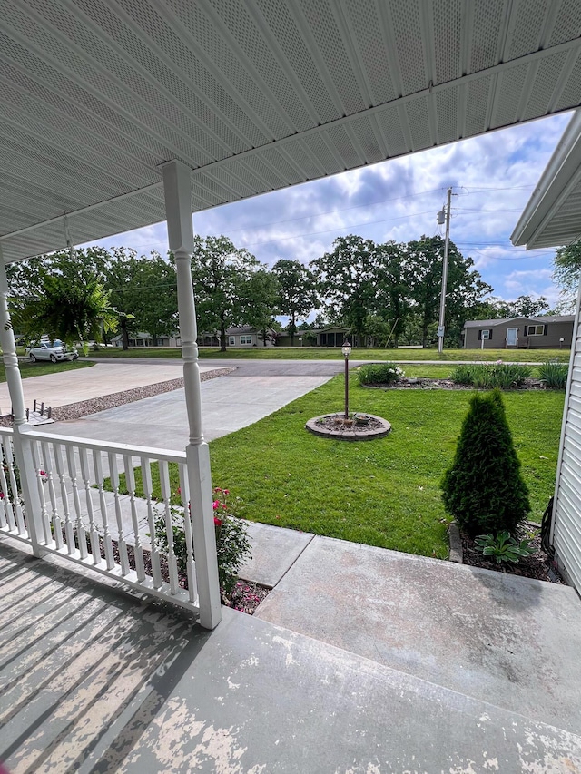 21650 Kings Loop, Hermitage, MO 65668 - covered porch featuring a lawn