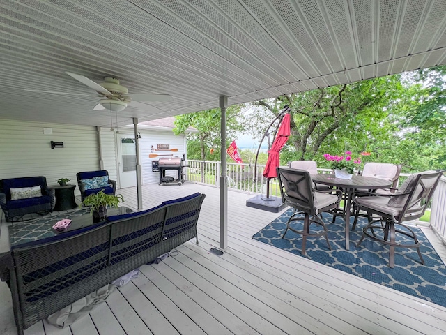 21650 Kings Loop, Hermitage, MO 65668 - wooden deck featuring outdoor dining area, ceiling fan, and a grill