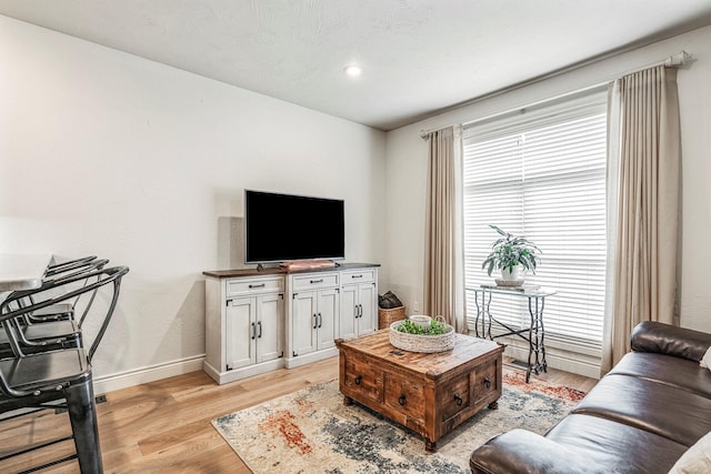 1086 S Joshua Ave, Republic, MO 65738 - living room with healthy amount of natural light, light wood-type flooring, baseboards, and recessed lighting