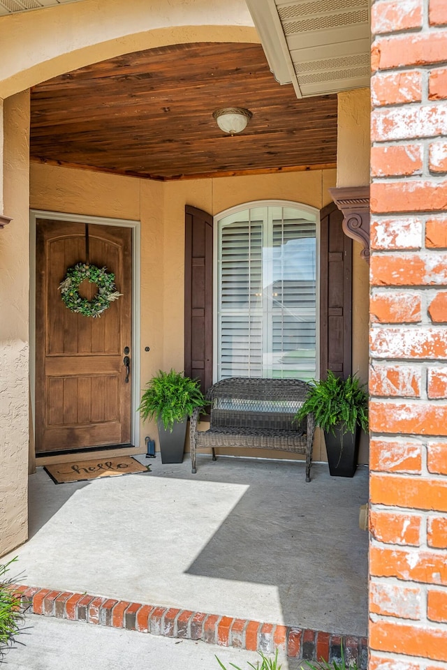 1086 S Joshua Ave, Republic, MO 65738 - doorway to property featuring a porch and stucco siding
