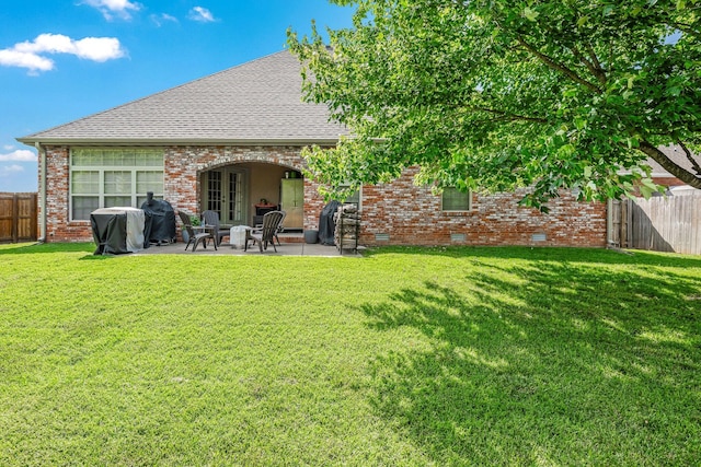 1086 S Joshua Ave, Republic, MO 65738 - rear view of property with crawl space, brick siding, a patio, and a shingled roof