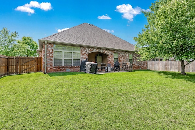 1086 S Joshua Ave, Republic, MO 65738 - rear view of property with a shingled roof, brick siding, and a patio