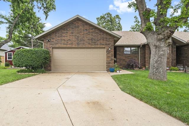 650 S Woodbridge Ct, Nixa, MO 65714 - ranch-style home featuring brick siding, a garage, and a front lawn