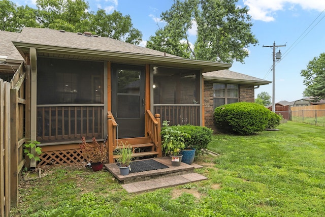 650 S Woodbridge Ct, Nixa, MO 65714 - view of exterior entry with a shingled roof and brick siding