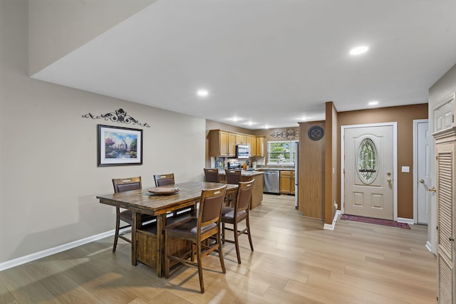 650 S Woodbridge Ct, Nixa, MO 65714 - dining room with light wood-style floors, baseboards, and recessed lighting