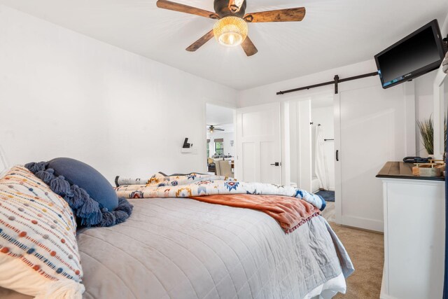 96 Samson St, Cape Fair, MO 65624 - bedroom featuring a barn door, light carpet, and a ceiling fan
