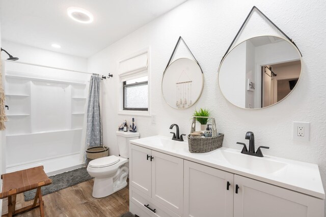 96 Samson St, Cape Fair, MO 65624 - bathroom featuring wood finished floors, toilet, curtained shower, and double vanity