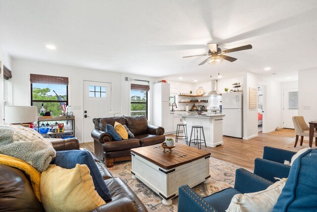 96 Samson St, Cape Fair, MO 65624 - living area featuring a ceiling fan, light wood finished floors, and recessed lighting