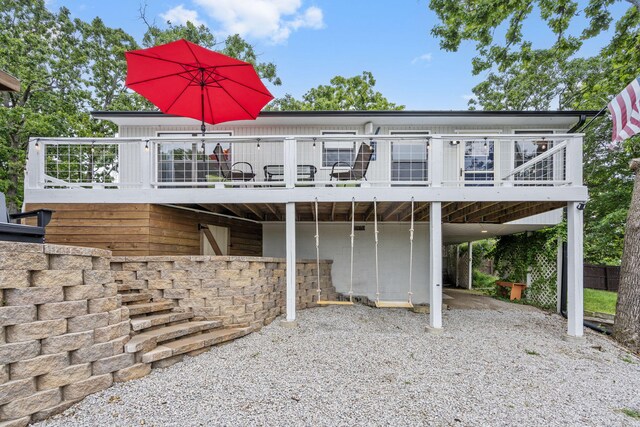 96 Samson St, Cape Fair, MO 65624 - rear view of house featuring a wooden deck and driveway