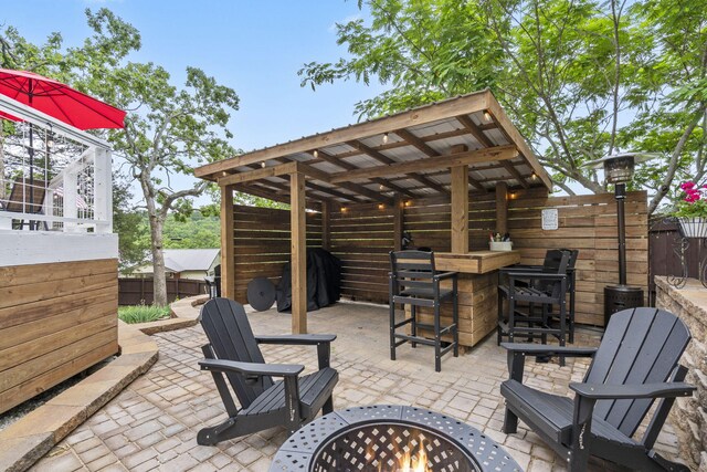 96 Samson St, Cape Fair, MO 65624 - view of patio featuring an outdoor fire pit