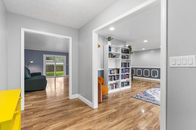 1514 W Swan St, Springfield, MO 65807 - corridor with wood finished floors, baseboards, a textured ceiling, and recessed lighting