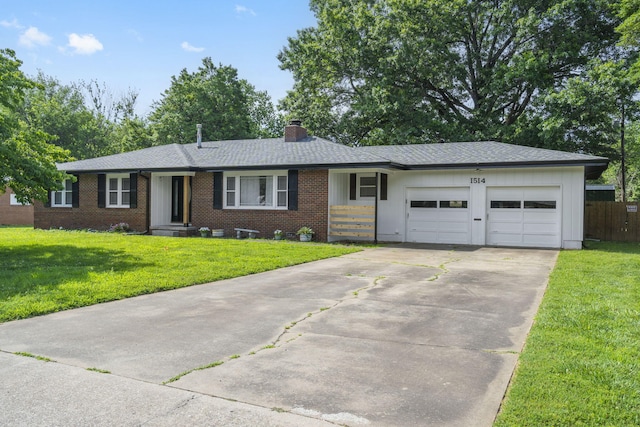 1514 W Swan St, Springfield, MO 65807 - single story home with an attached garage, concrete driveway, a chimney, a front lawn, and brick siding