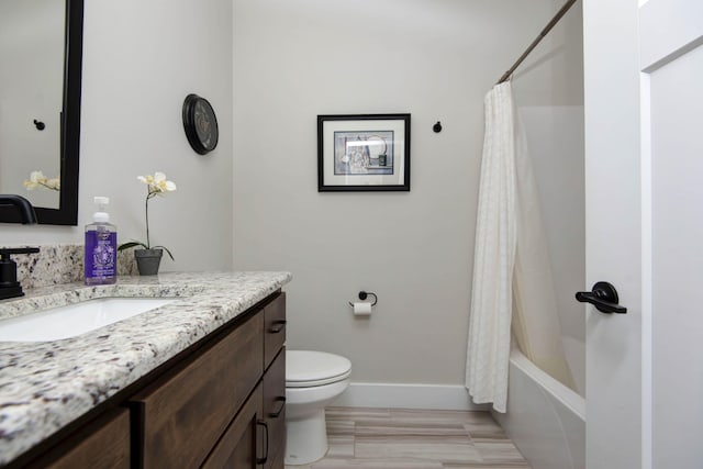 1503 W Ragweed Ct, Ozark, MO 65721 - bathroom featuring vanity, toilet, baseboards, and shower / tub combo with curtain