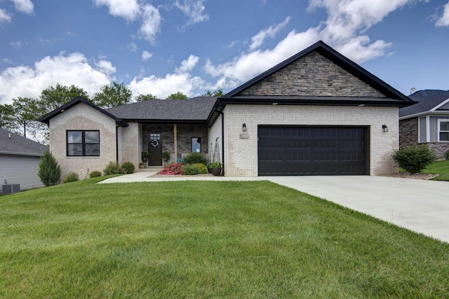 1503 W Ragweed Ct, Ozark, MO 65721 - view of front facade with brick siding, a garage, a front lawn, concrete driveway, and central AC