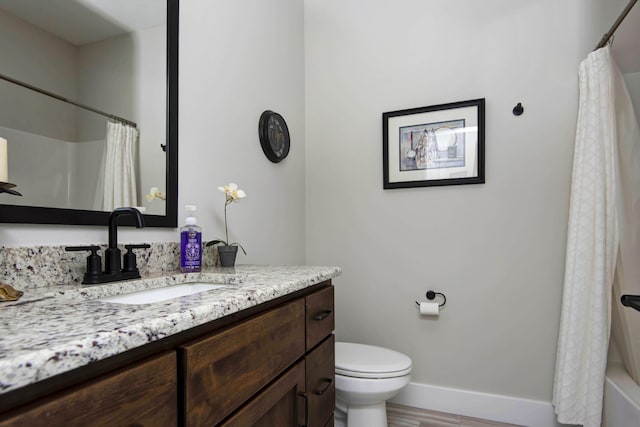 1503 W Ragweed Ct, Ozark, MO 65721 - bathroom with toilet, vanity, and baseboards