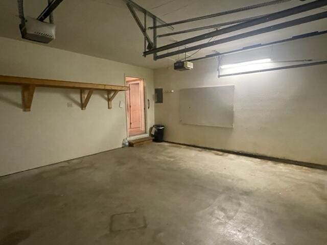 607 Robin Rd, Mountain Grove, MO 65711 - garage featuring a garage door opener