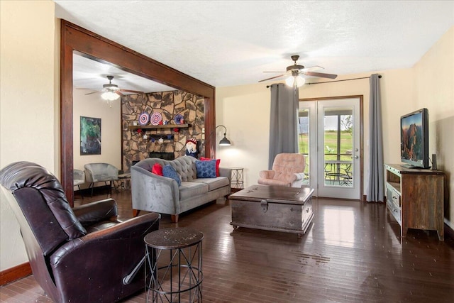 898 Short State Highway Y, Marshfield, MO 65706 - living room featuring a ceiling fan, wood-type flooring, baseboards, beamed ceiling, and a textured ceiling