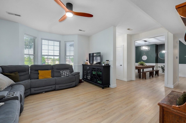 505 Thunderbird Dr, Rogersville, MO 65742 - living room featuring plenty of natural light, light wood-style flooring, a ceiling fan, and baseboards